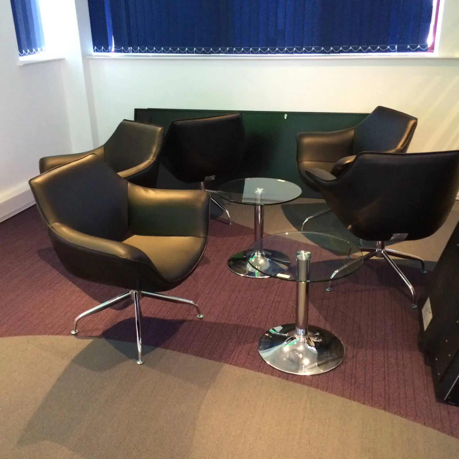 PEL UK Offices space with designer furniture and wall mounted digital screens 1